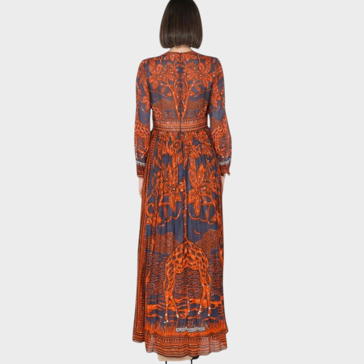Back view of a Tasoni Valentino Giraffe Bambolina maxi dress featuring a dark blue and orange animal print pattern.