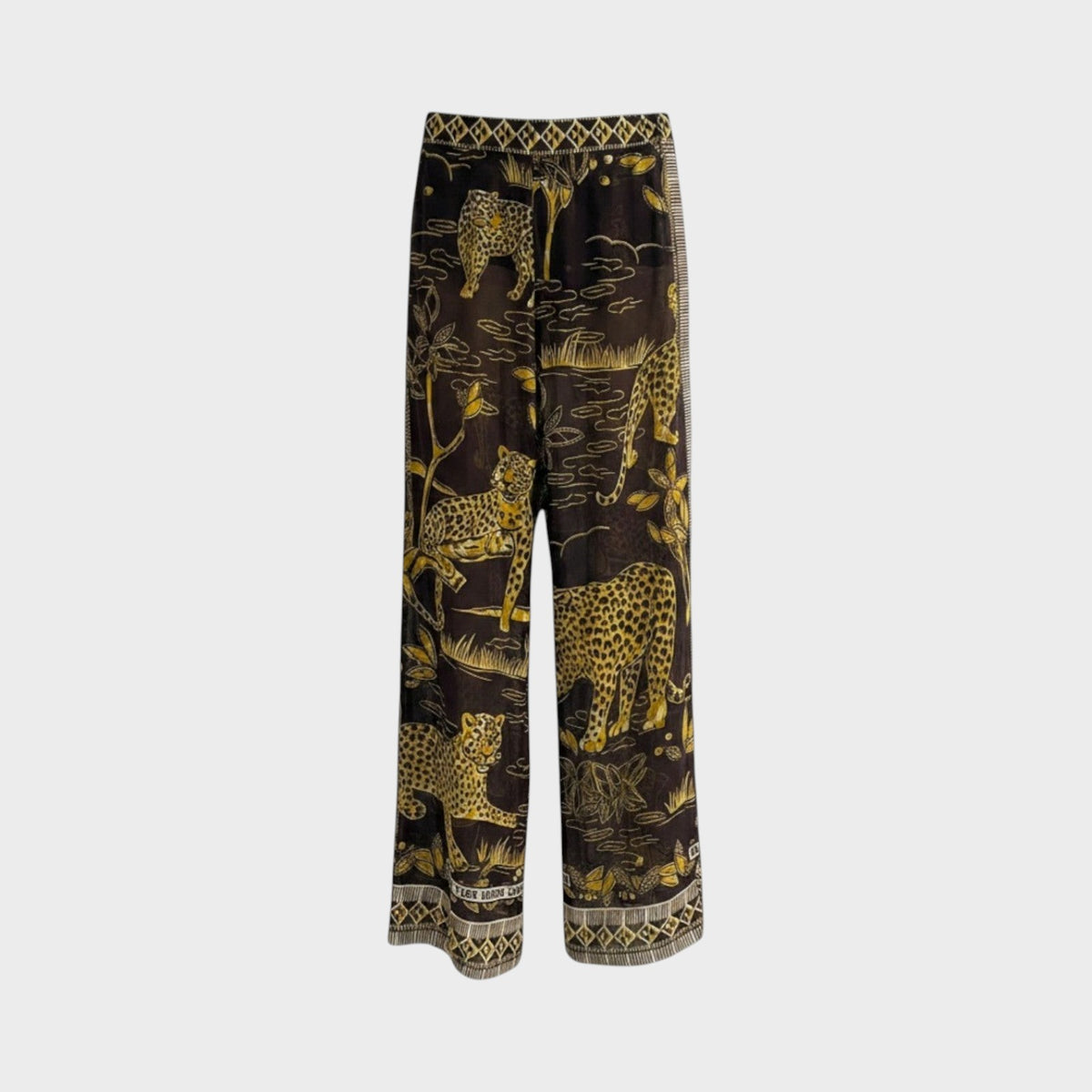 Tasoni Valentino long trousers featuring a brown and yellow leopard print pattern with geometric border details.