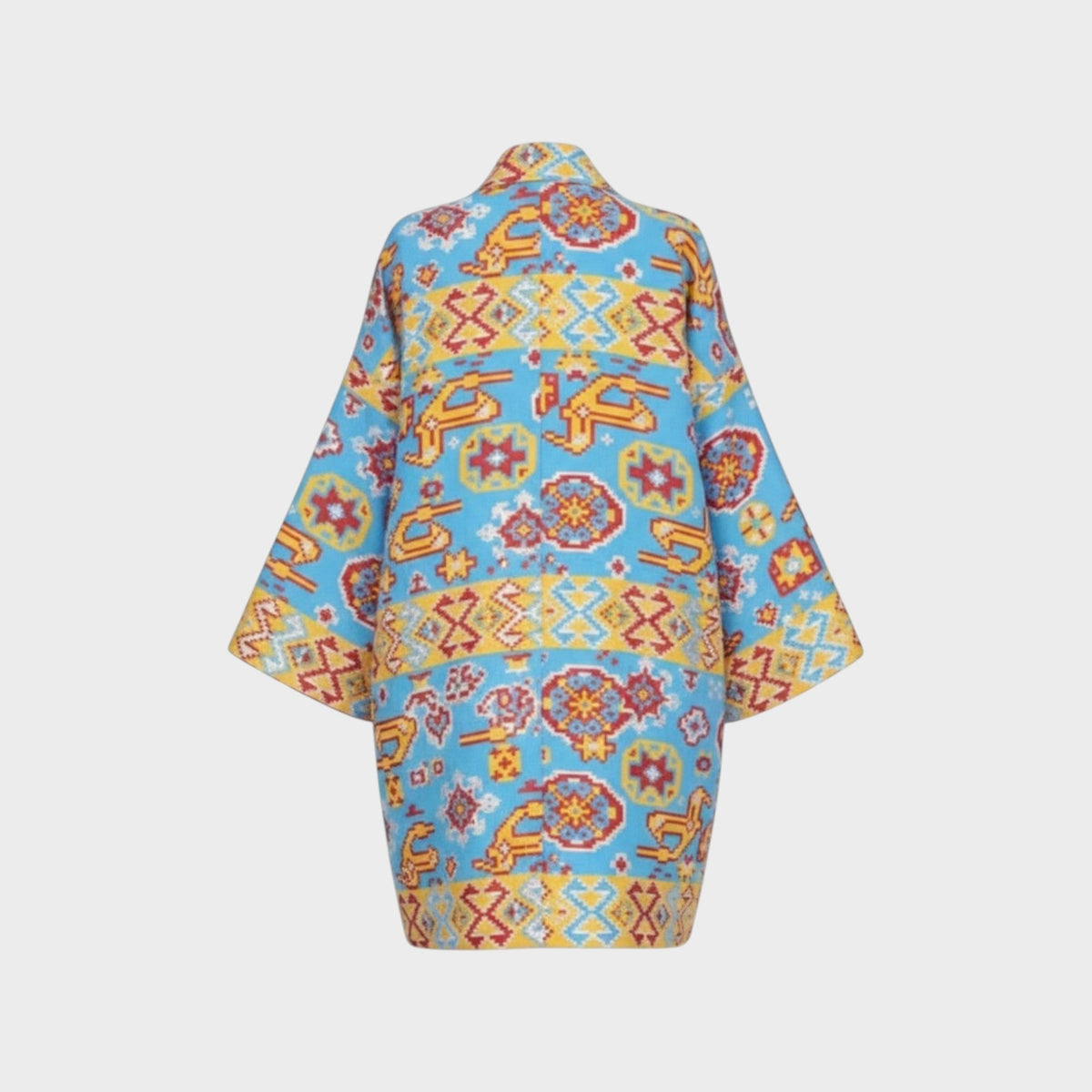 Tasoni Valentino Navajo jacquard print cape in blue with yellow and red geometric patterns, back view.