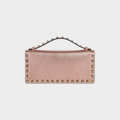Tasoni Valentino Rockstud wallet in rose gold metallic leather with signature pyramid studs.