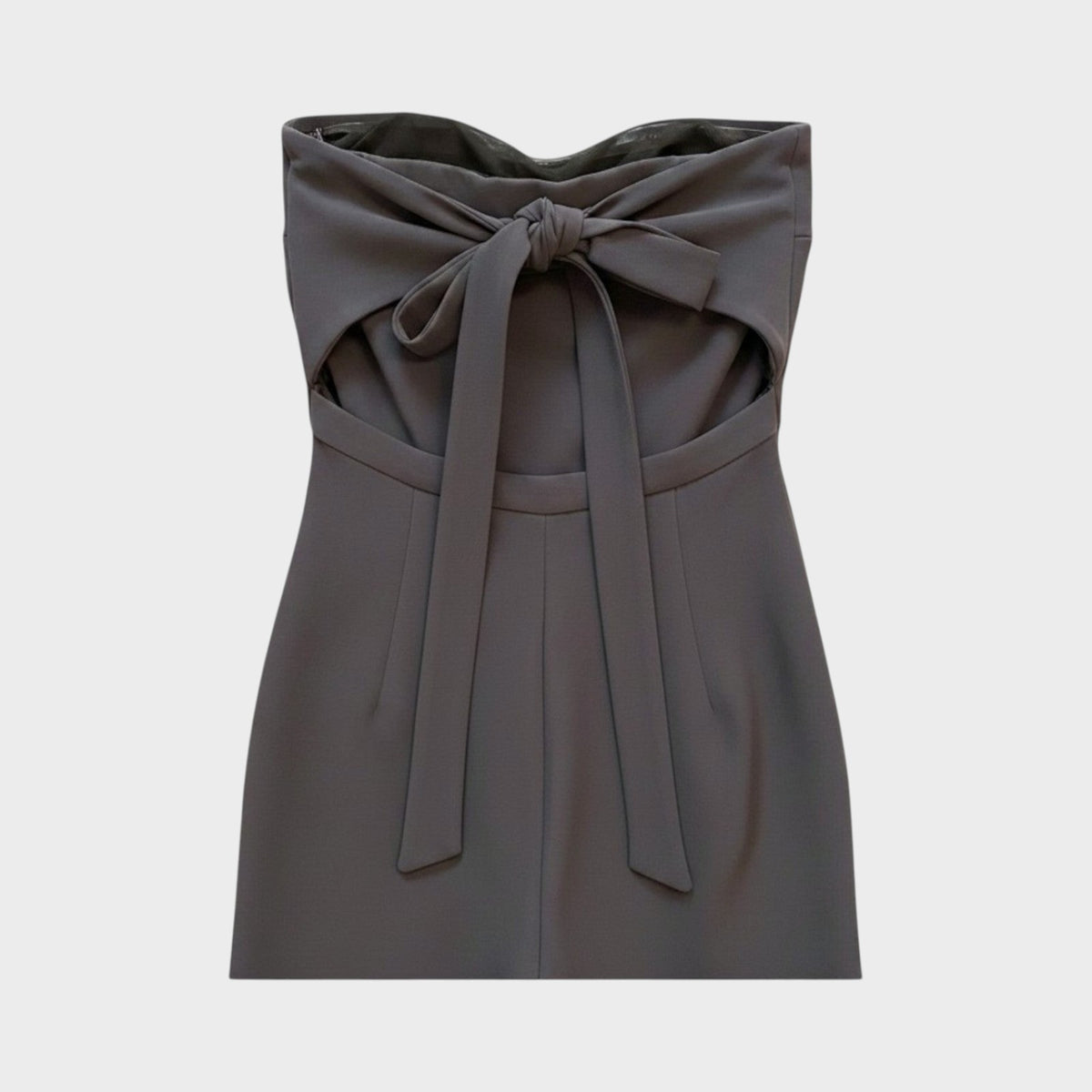 Tasoni Valentino strapless jumpsuit in charcoal grey featuring a front bow detail and a cut-out back design.