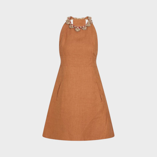 Tasoni Valentino linen dress in tan featuring a sleeveless A-line silhouette and a decorative embellished neckline.