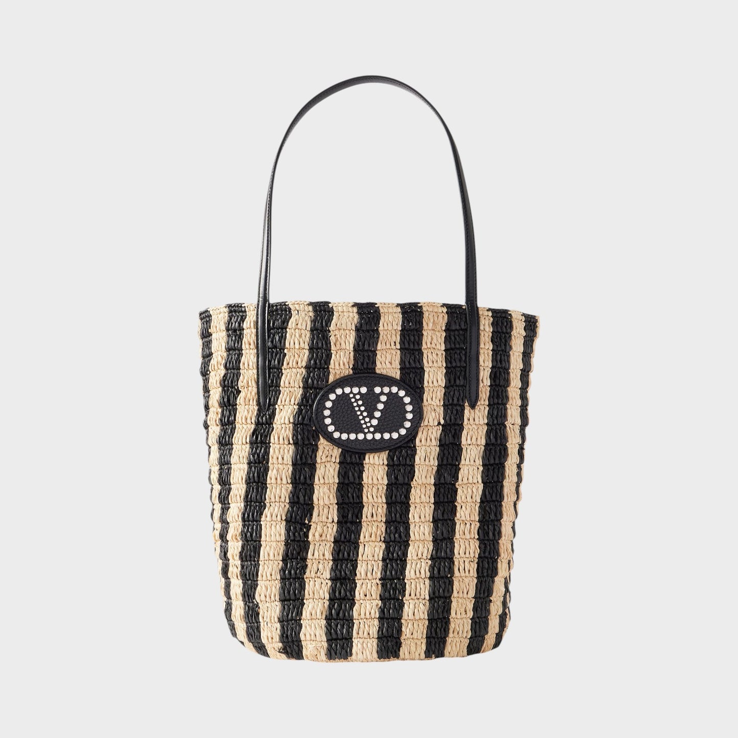 Tasoni Valentino V-Logo Crochet Raffia Bucket Bag with black and natural stripes and leather trim.