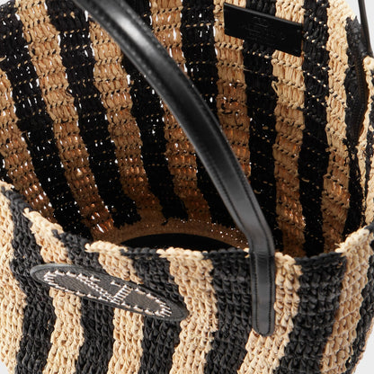 Tasoni Valentino V-Logo crochet raffia bucket bag with black and natural stripes and leather handles.
