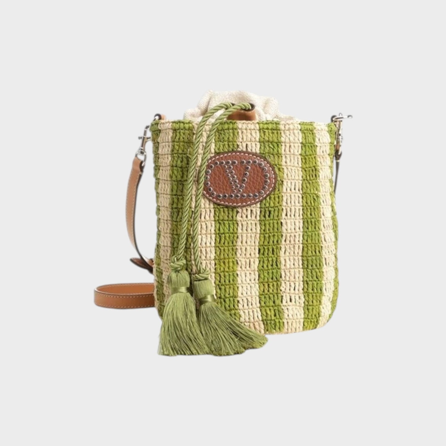 Tasoni Valentino V-Logo crochet raffia striped small bucket bag in natural and green with leather trim and tassels.