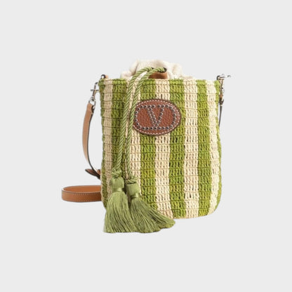 Tasoni Valentino V-Logo crochet raffia striped small bucket bag in natural and green with leather trim and tassels.