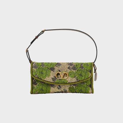 Tasoni Valentino V-Logo Jacquard Small Shoulder Bag in green, black, and gold with floral embroidery.