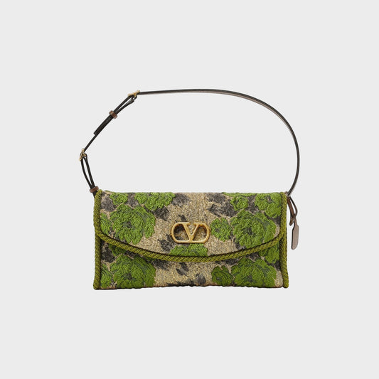 Tasoni Valentino V-Logo Jacquard Small Shoulder Bag in green, black, and gold with floral embroidery.