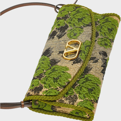 Tasoni Valentino V-Logo Jacquard Small Shoulder Bag in green, black, and gold with floral embroidery and gold hardware.