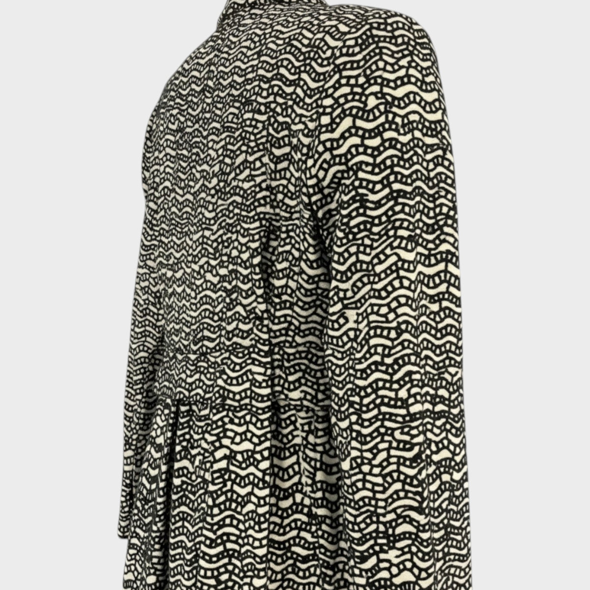 Tasoni Valentino velvet jacquard coat in black and white with a geometric wave pattern, side view.