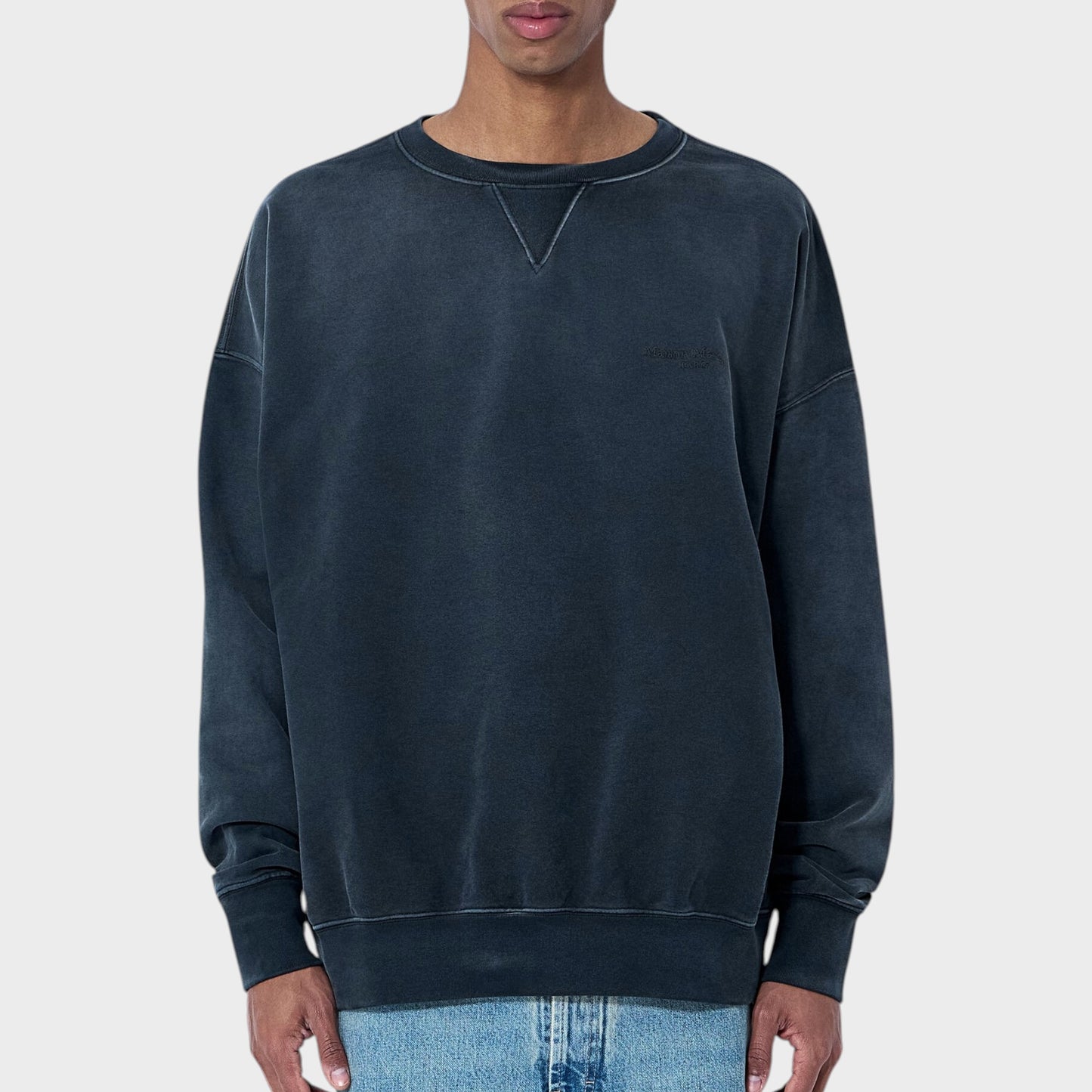 Tasoni Maison Margiela vintage black cotton crew neck sweatshirt with subtle embroidered logo on chest.