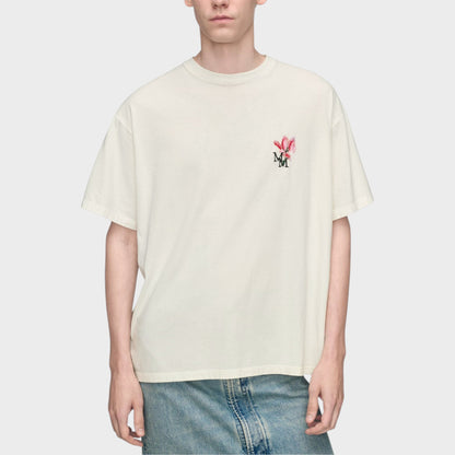 Tasoni Maison Margiela off-white cotton crew neck t-shirt with floral MM embroidery on chest.