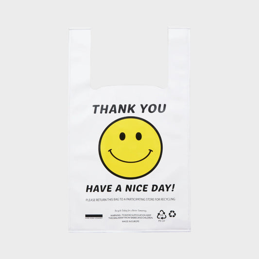 Tasoni white leather bag with "Thank You Have A Nice Day" text and a yellow smiley face graphic.