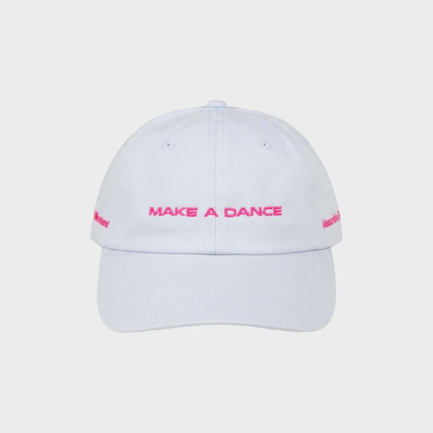 Tasoni x Alexandra Bachzetsis light blue baseball cap with pink embroidery 'MAKE A DANCE' and 'Weekend' text.