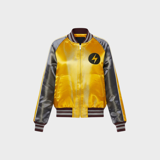 Tasoni yellow satin bomber jacket with grey sleeves, standing collar, and black lightning bolt emblem on chest.
