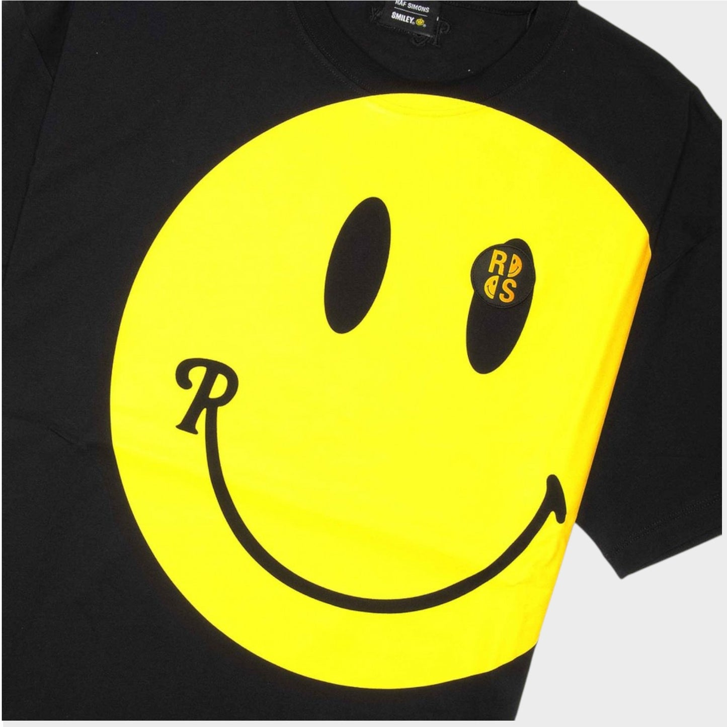 Raf Simons T-Shirt, Print, RS x Smiley Cotton Jersey Big Fit Crew Neck T-Shirt in Black w/ Large Yellow Smiley Print