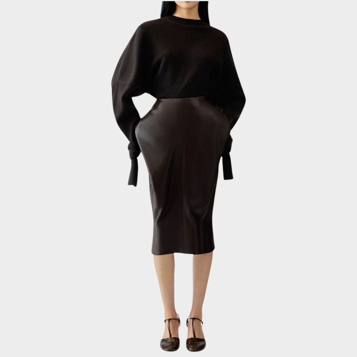 Tasoni Jacquemus dark brown wool and cashmere bat-sleeve sweater paired with a structured midi skirt